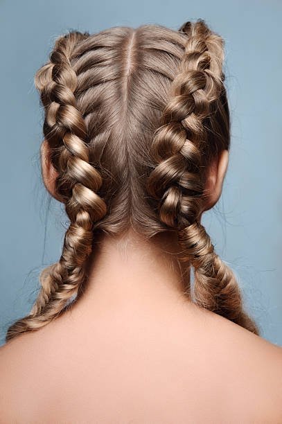 Beauty model with braids from back Beauty female model with braids from back hairstyles woman stock pictures, royalty-free photos & images